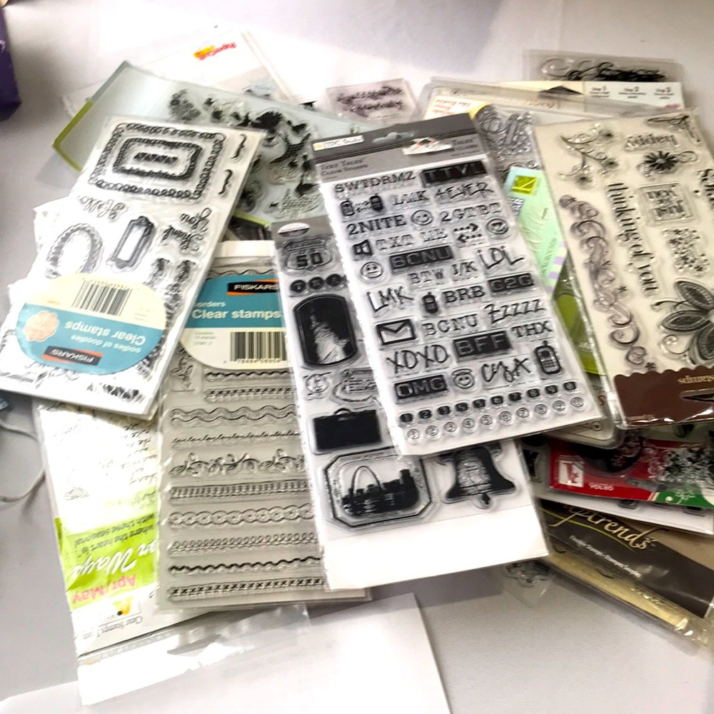 Over 20 clear stamp packs .different  brands .